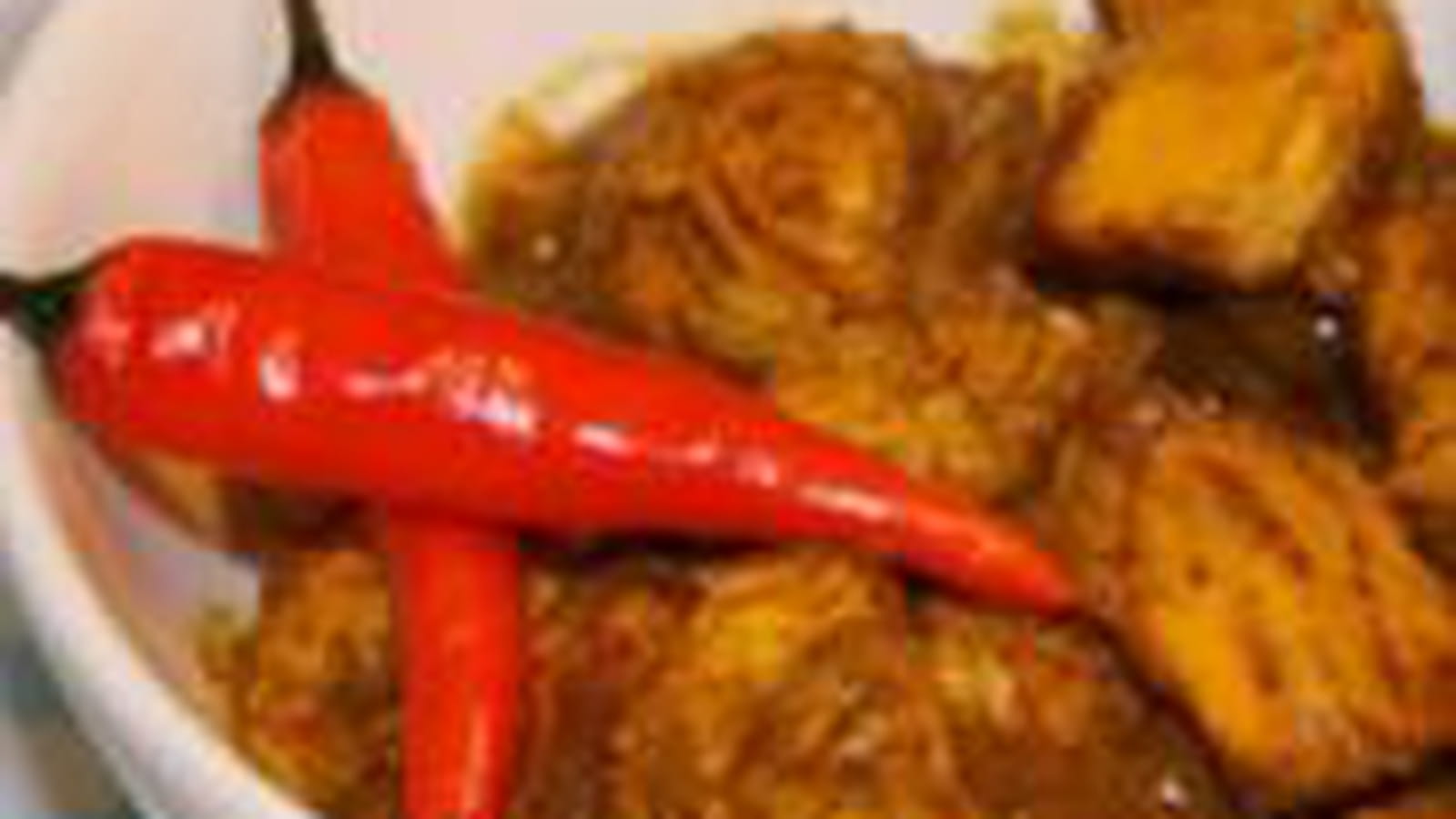 Poulet à la pâte de curry rouge et au piment