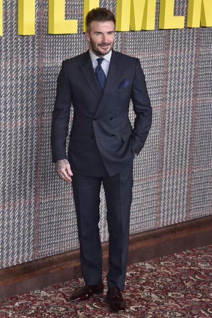 David Beckham en costume bleu marine et cravate
