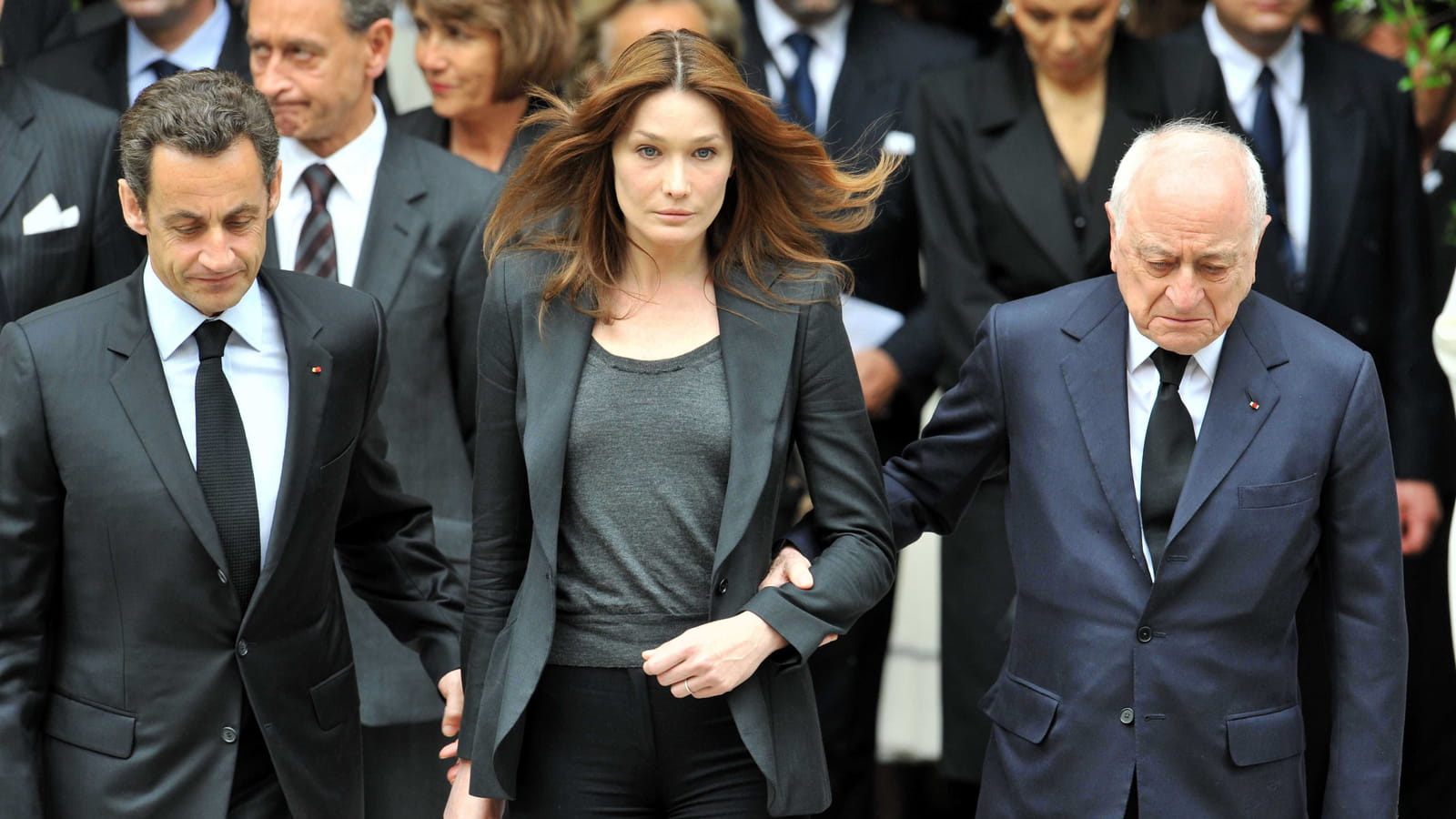 Avec Nicolas Sarkozy et Carla Bruni aux obsèques de YSL