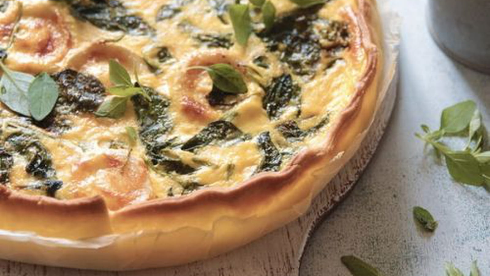 Quiche à la ricotta, chèvre et jeunes pousses d'épinard