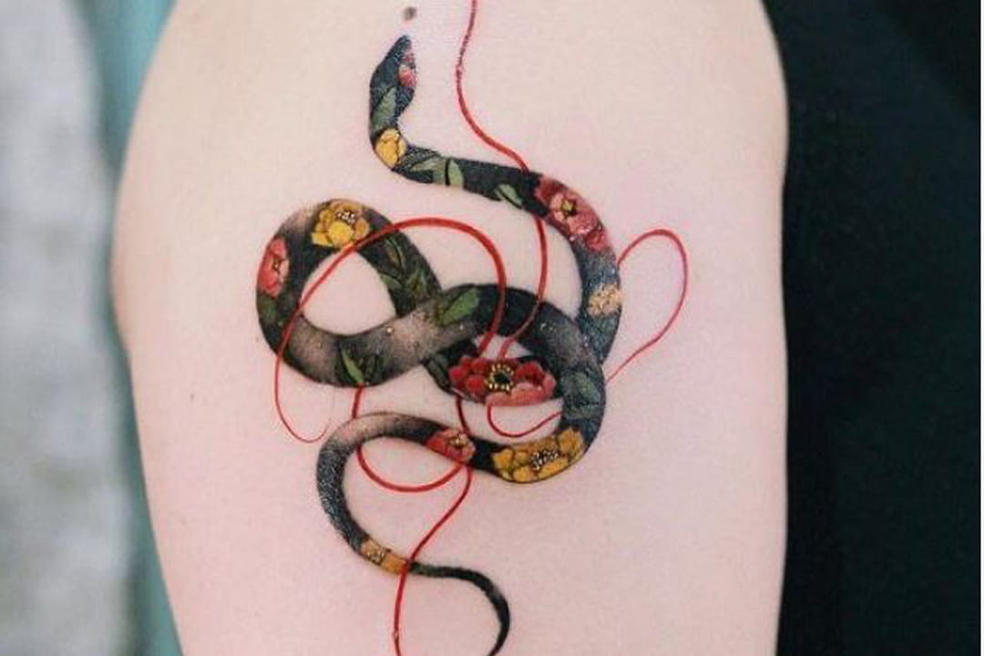 Serpent japonisant sur le bras