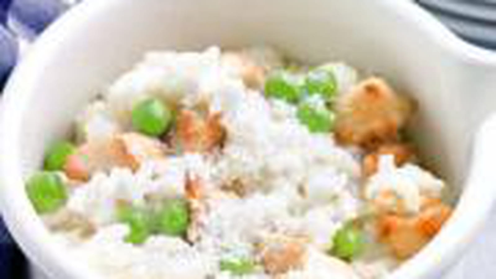 Risotto crémeux aux petits pois et dés de poulet