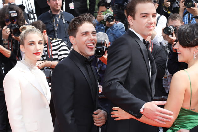 Xavier Dolan est visiblement heureux de remonter les marches de Cannes...