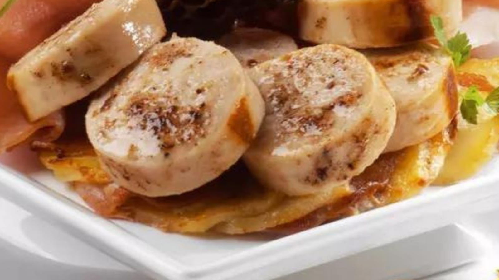 Boudin blanc aux morilles et sa galette de jambon cru