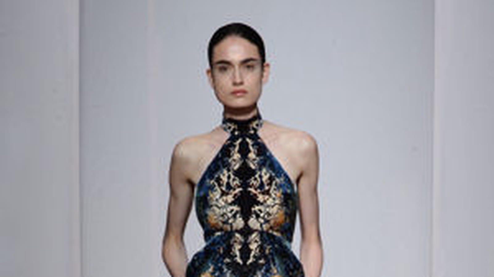 Yiqing Yin