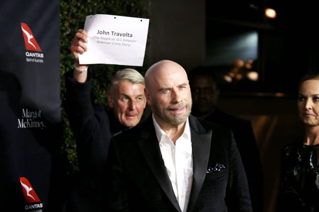 John Travolta : laissez parler les p'tits papiers