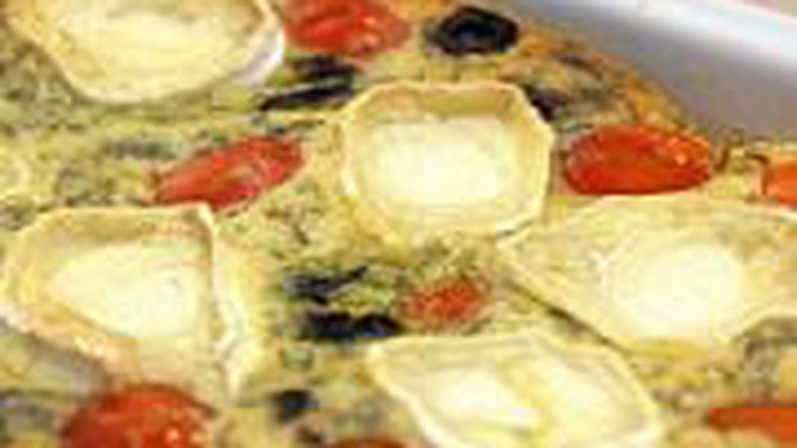 Clafoutis aux tomates cerise, olives noires et chèvre