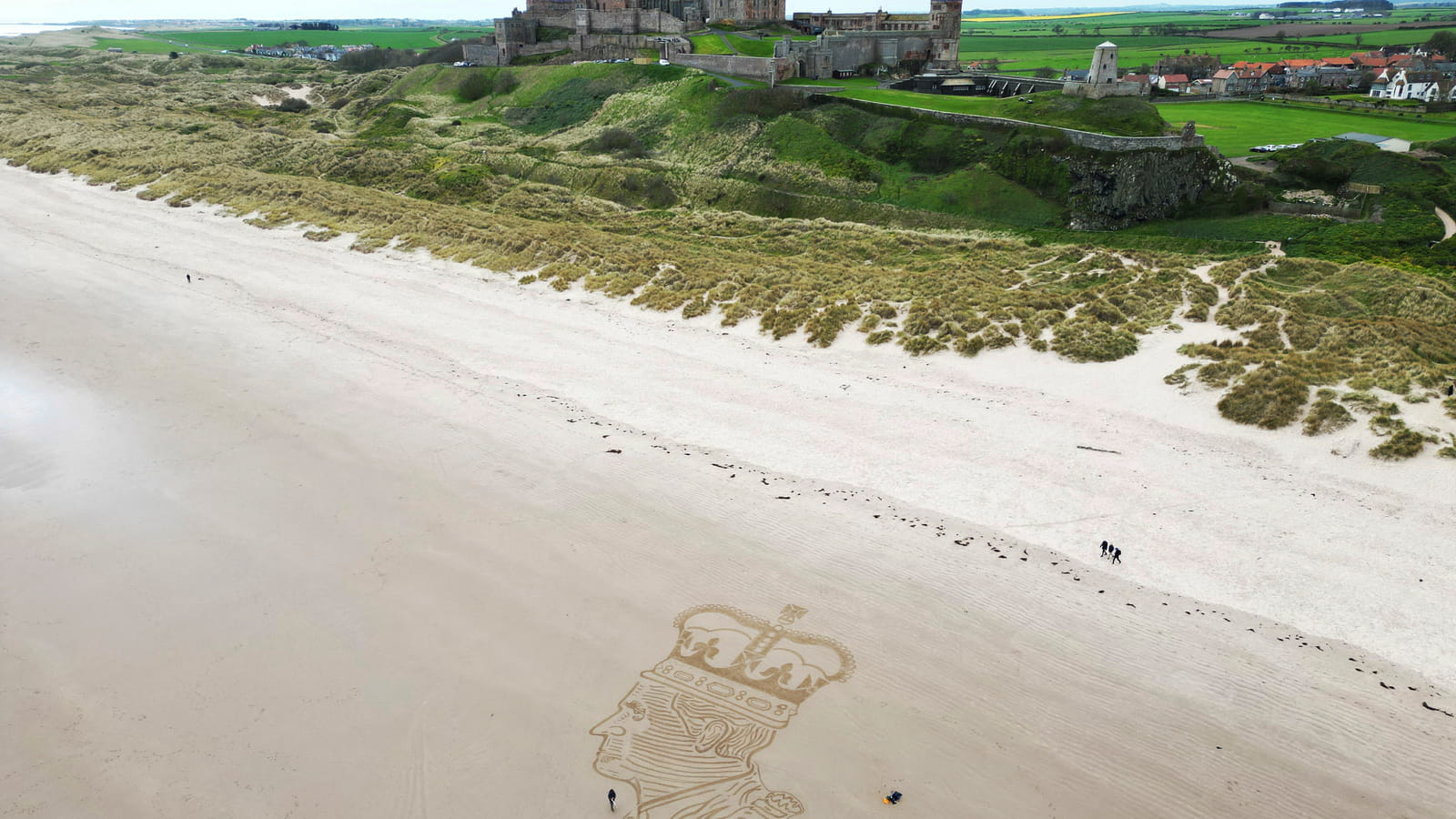 Le roi gravé sur le sable