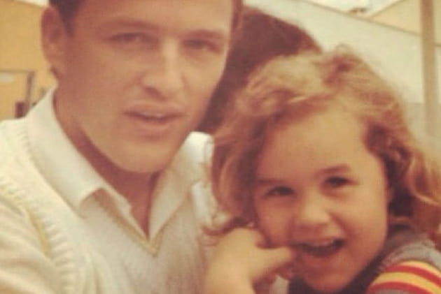 Laeticia, enfant et son père