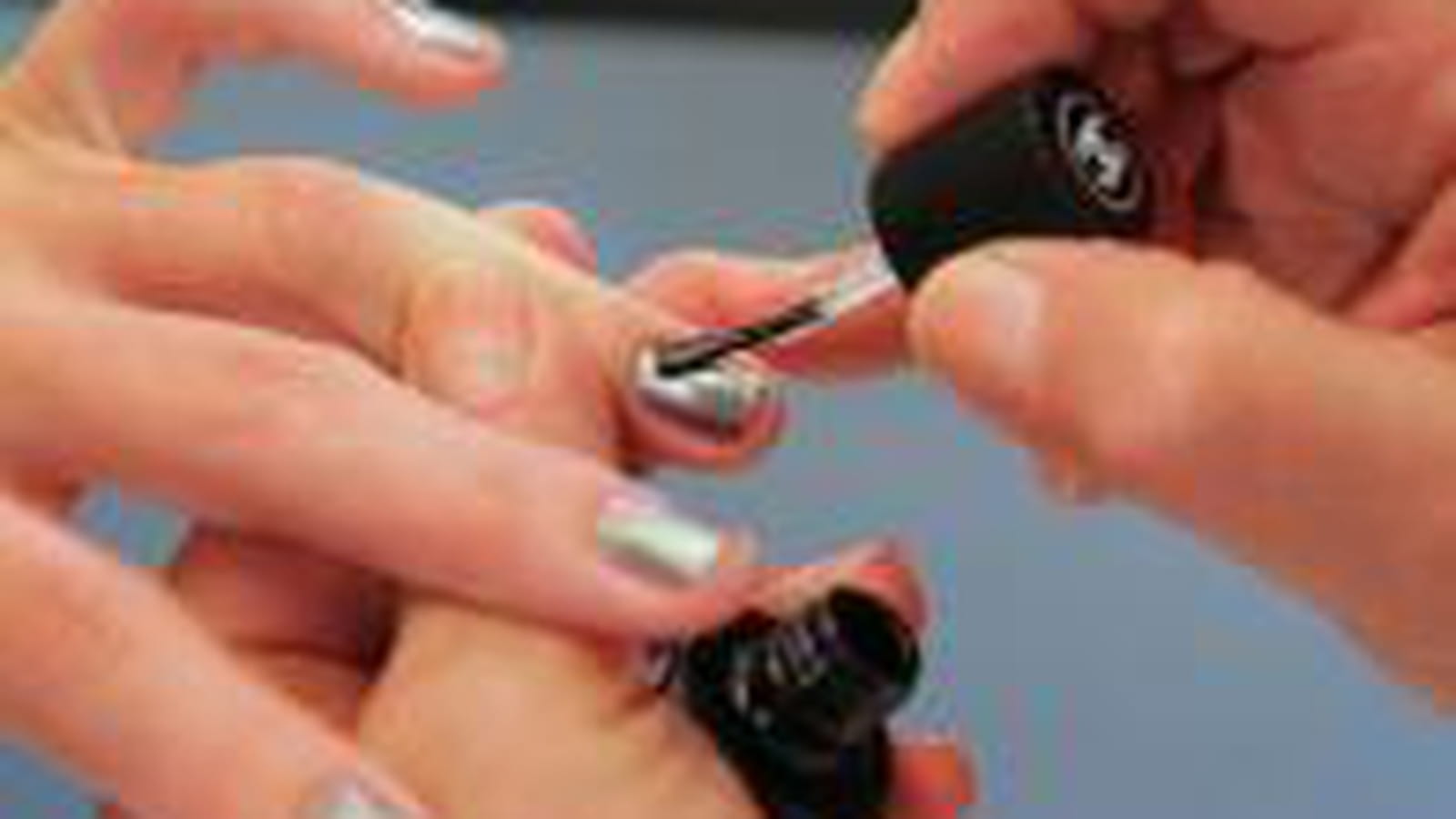 La pose du top coat