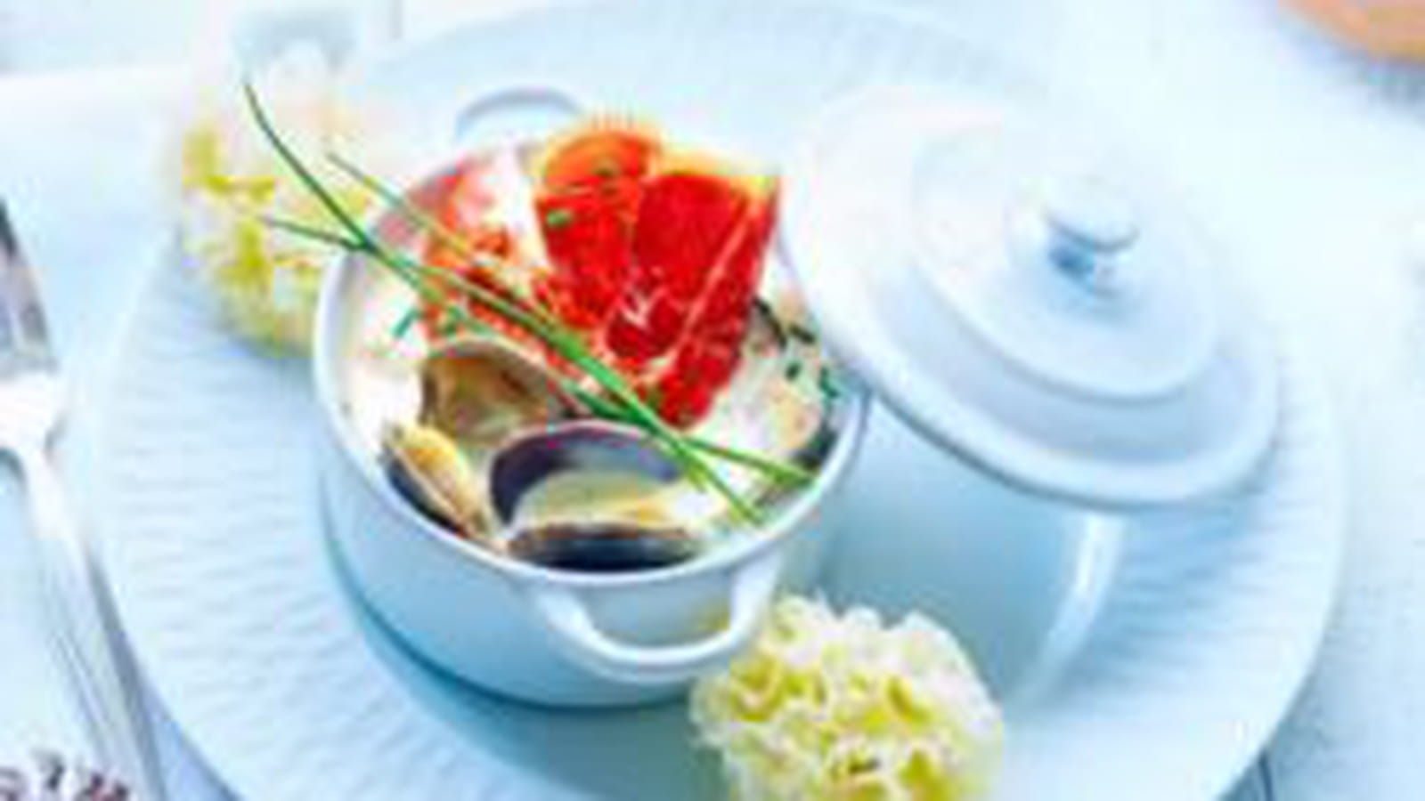 Cassolette de homard et palourdes à la Tête de Moine AOP
