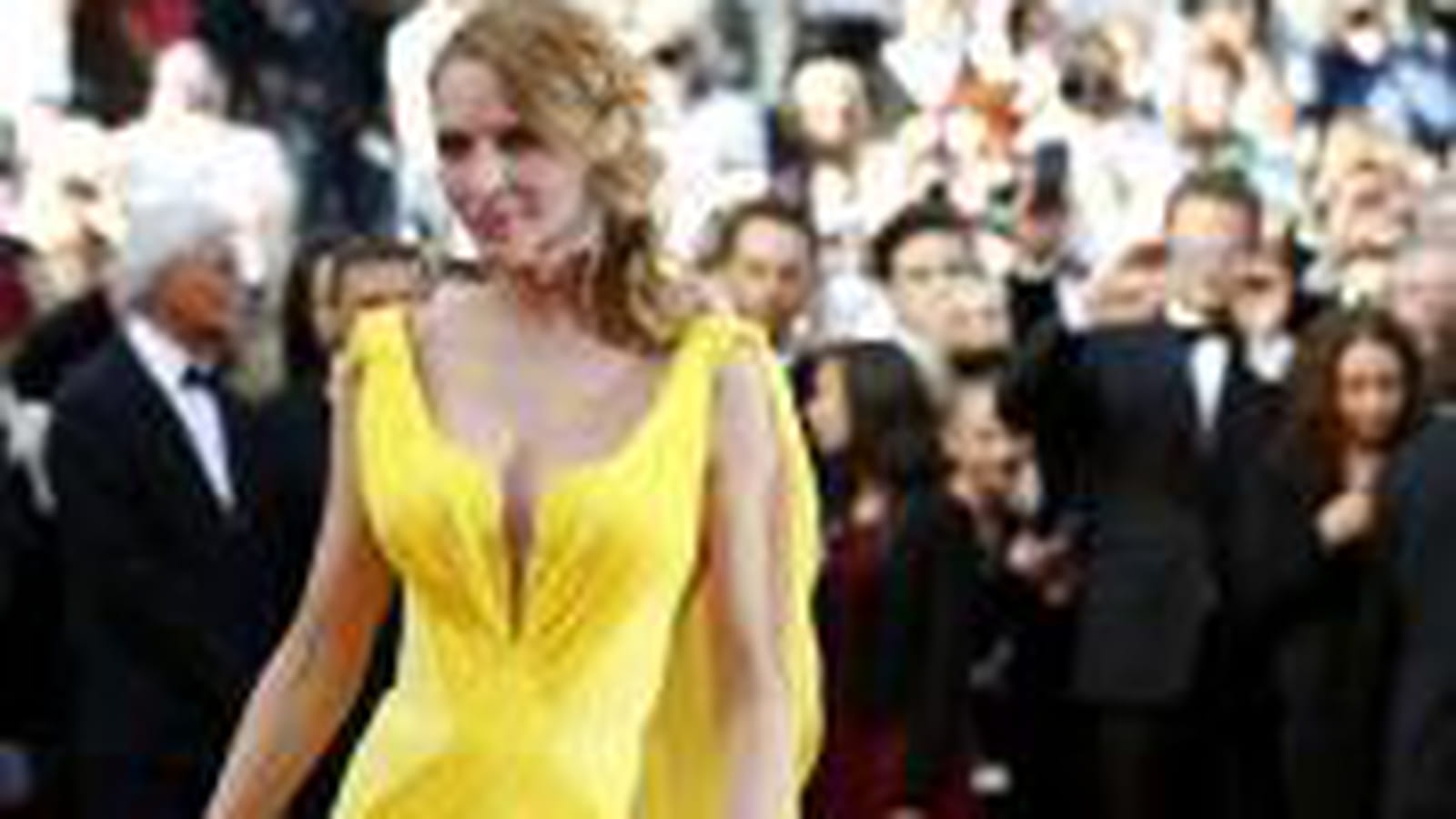 Uma Thurman, ensoleillée en Atelier Versace