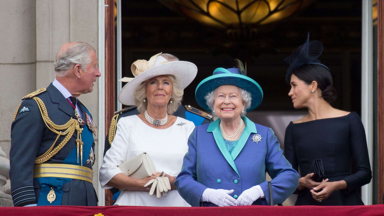 Avec Charles, Elisabeth II et Meghan Markle en juillet 2018