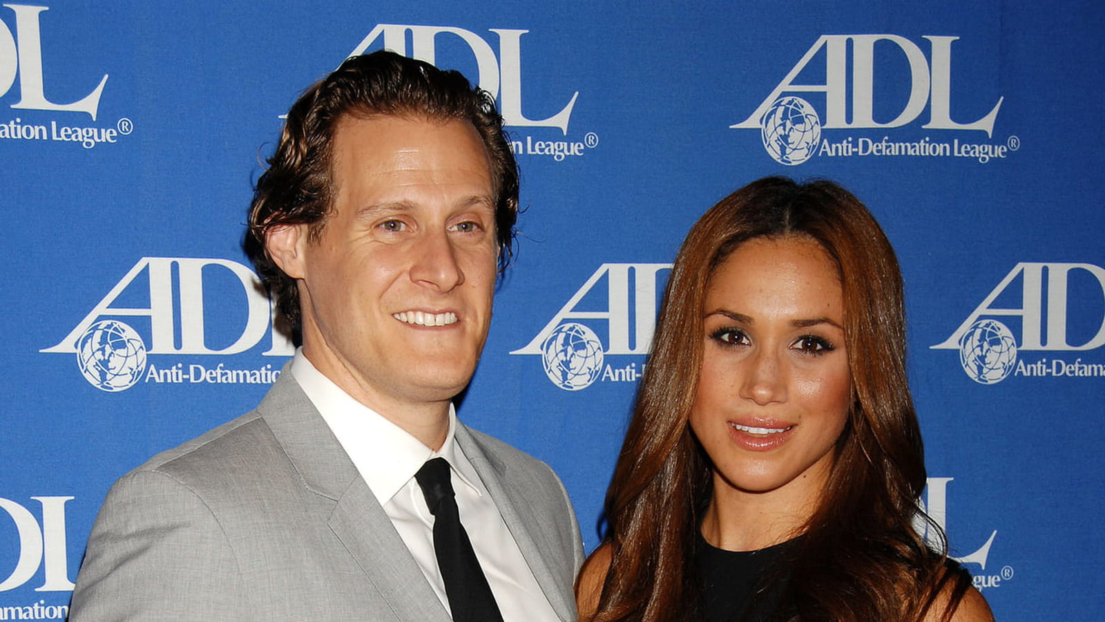 Trevor Engelson et Meghan Markle