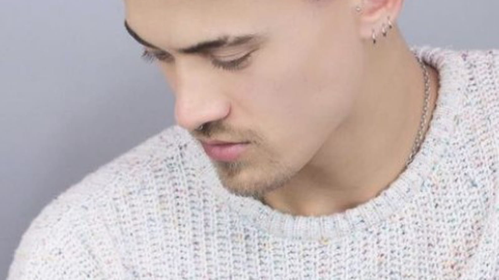 Coupe taper rose pastel pour homme