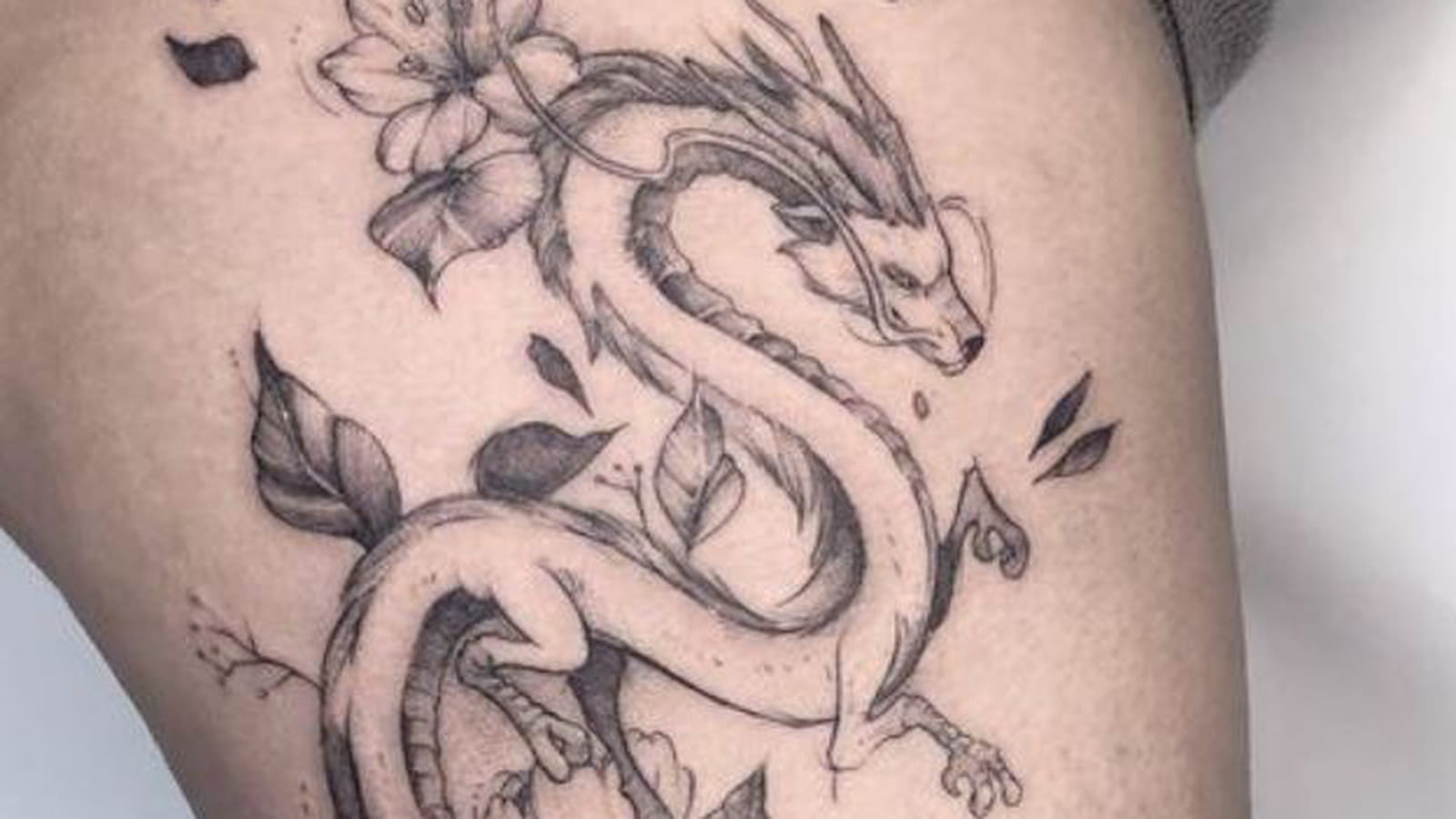Dragon sur la cuisse