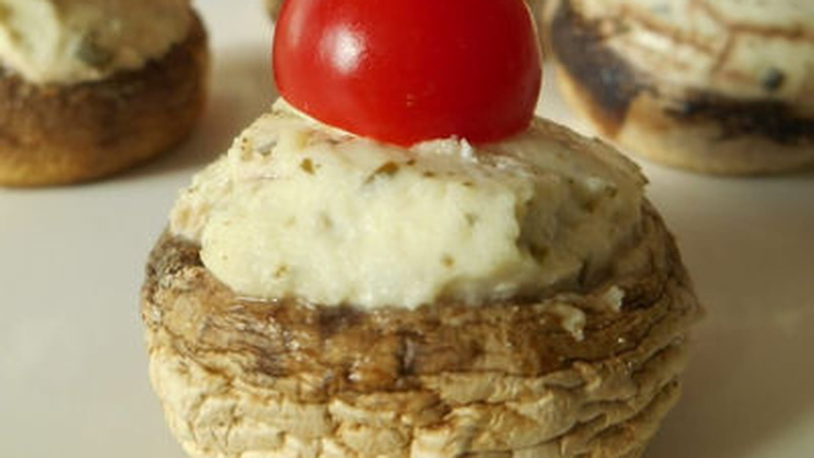 Champignons farcis au fromage ail et fines herbes