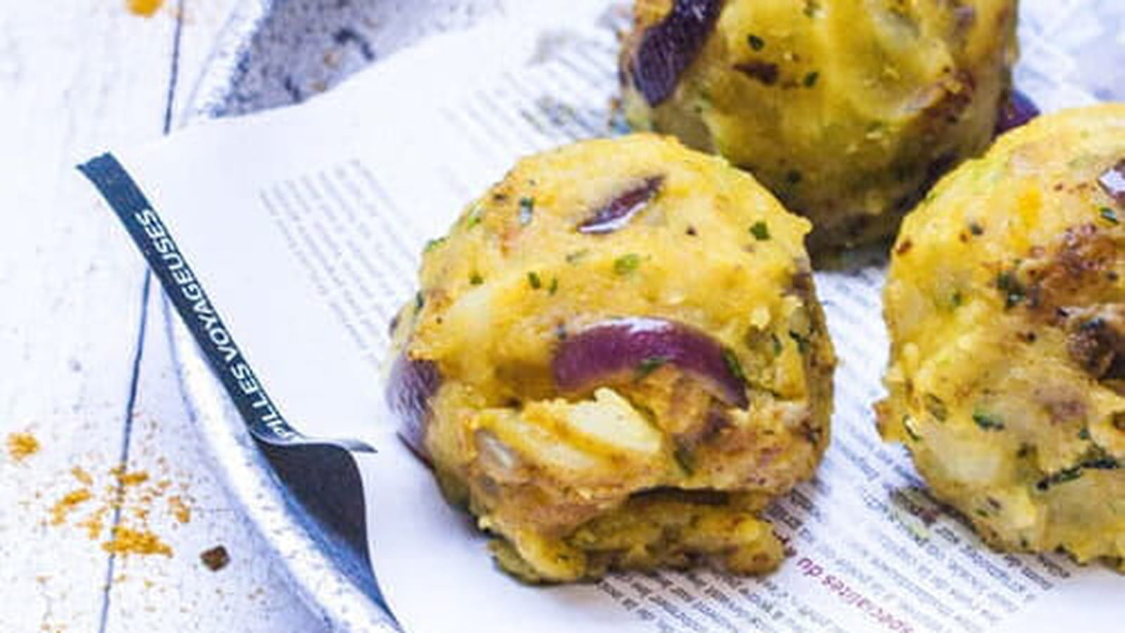 Boulettes de purée à l'indienne fourrées au poulet Korma