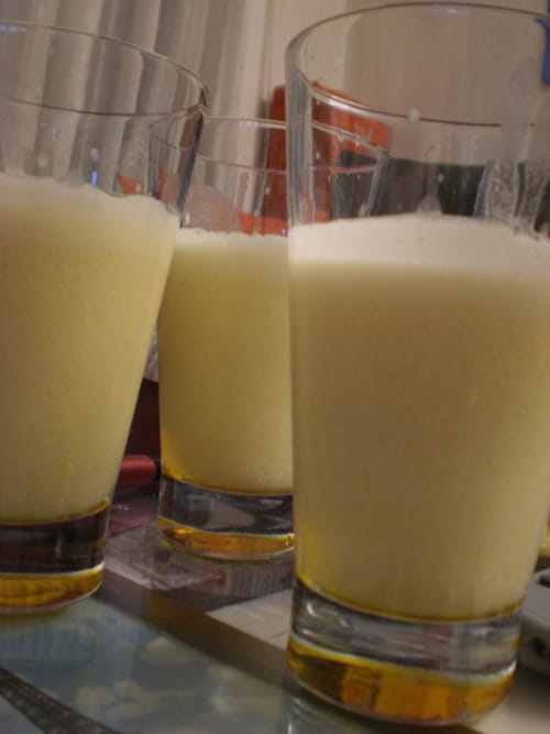 Punch au jus d'ananas, orange et lait de coco