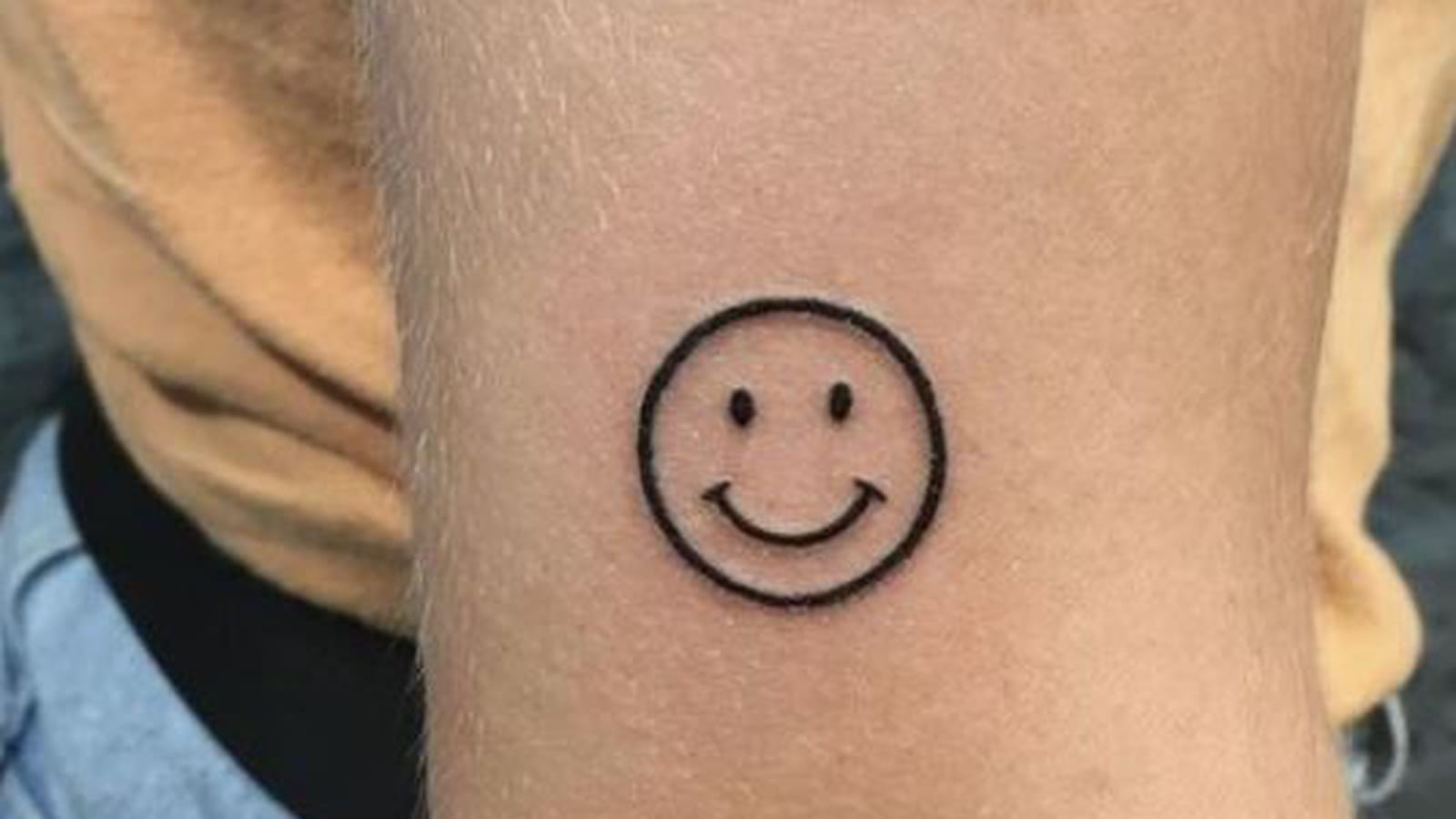 Smiley sur le bras