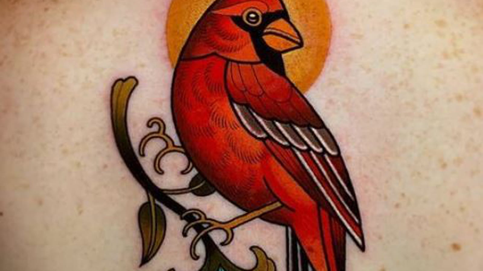 Oiseau rouge old school dans le dos
