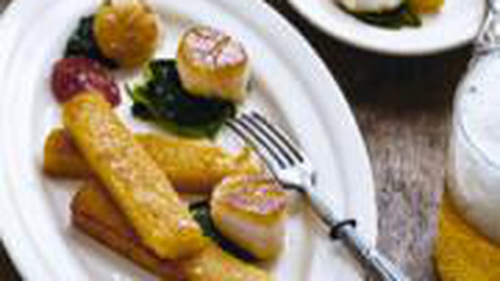 Noix de Saint-­Jacques sur lit d'épinards, polenta citronnée à la bière Edelweiss