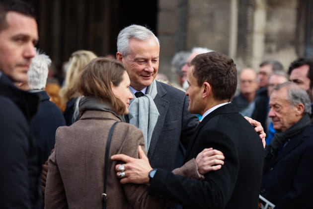 Bruno Le Maire sort de l'église après les obsèques de Philippe Tesson