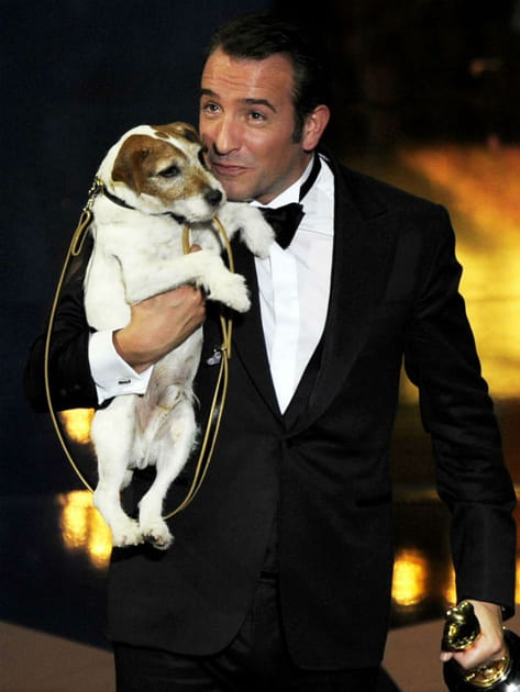 Jean Dujardin et Uggie aux Oscars