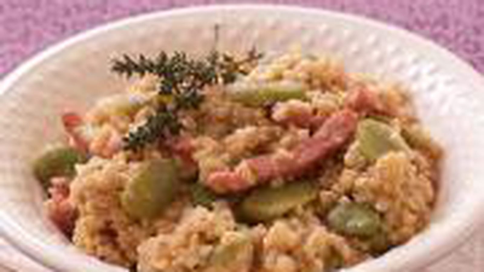 Risotto de millet aux lardons et fèves