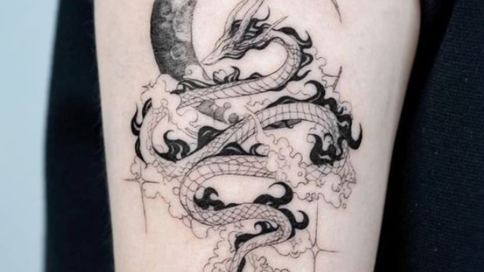 Dragon céleste sur le bras