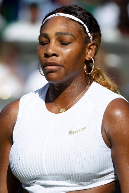 Serena Williams avec créoles et médaille dorée