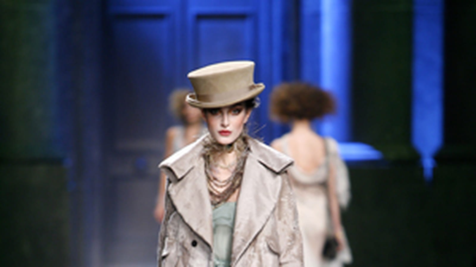 Veste en astrakan taupe