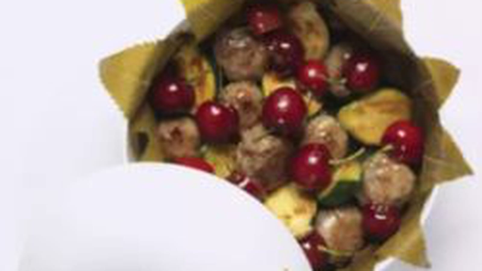 Caillettes de canard en cassolette aux cerises et courgettes rondes