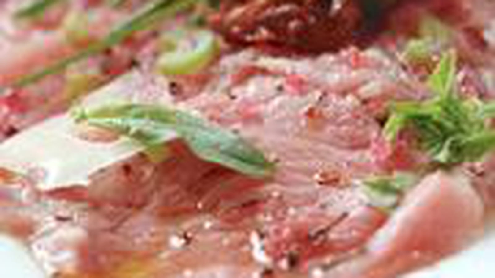Carpaccio de veau, pétales d'emmental