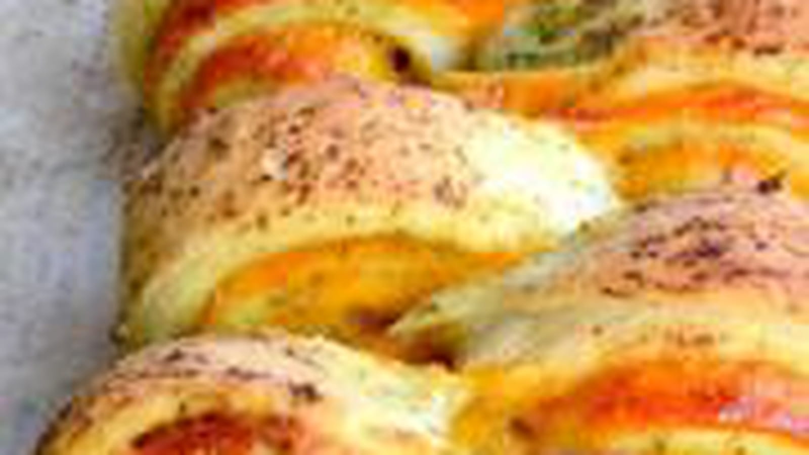 Pain au cheddar, à l'ail & aux herbes