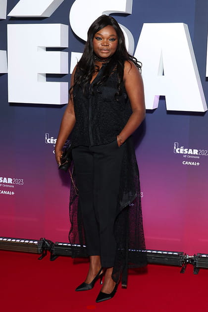 Guslagie Malanda en ensemble Louis Vuitton