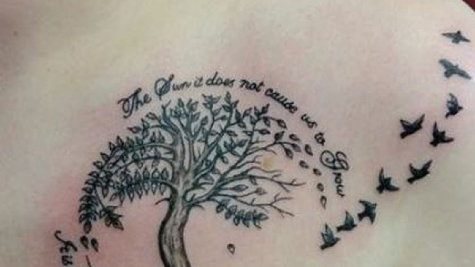Arbre de vie et oiseaux sur le torse