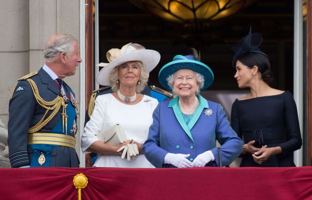 Avec Charles, Elisabeth II et Meghan Markle en juillet 2018