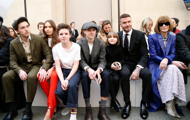 David Beckham et ses enfants pour le show de Victoria Beckham, lors de la Fashion Week de Londres.&nbsp;