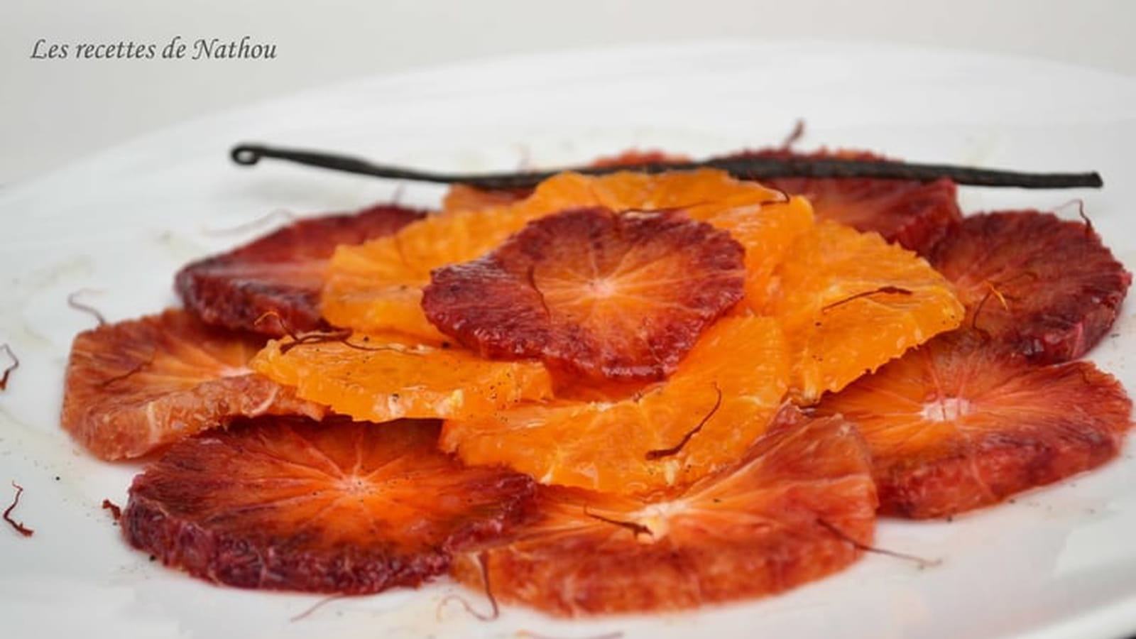 Carpaccio d'oranges sanguines et de clémentines, sirop au miel vanillé