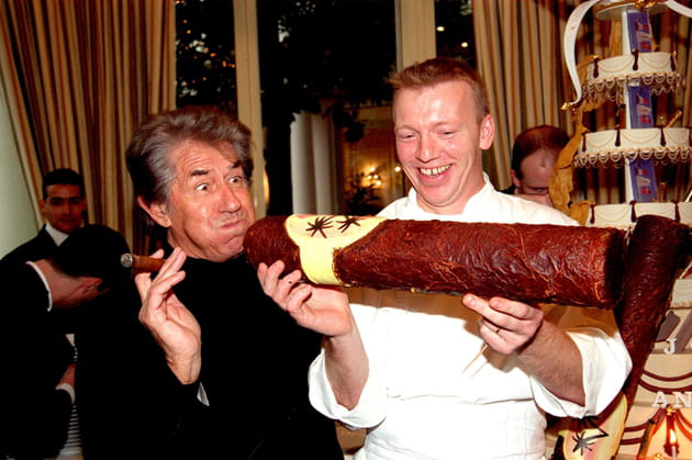 Très occupé avec un très gros cigare, en 2002