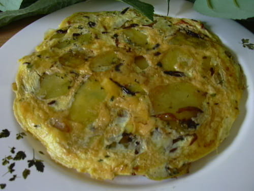 Omelette de pommes dorées à la graisse d'oie