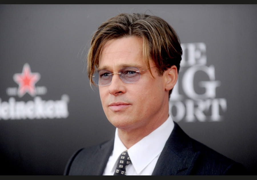 Les m&egrave;ches dor&eacute;es de Brad Pitt