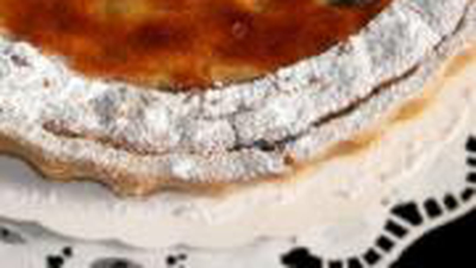 Tarte amandine, pommes, raisins secs, orange