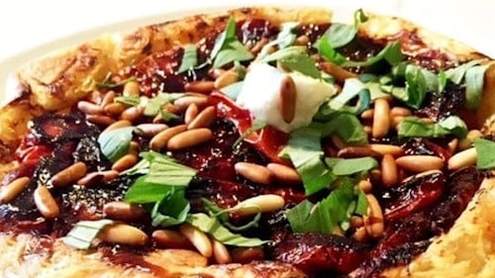 Tarte tatin aux tomates confites et thym