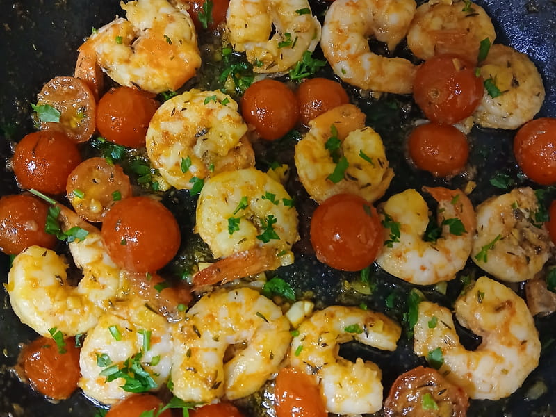 Recette de Crevettes sautées à l'ail et tomates cerises