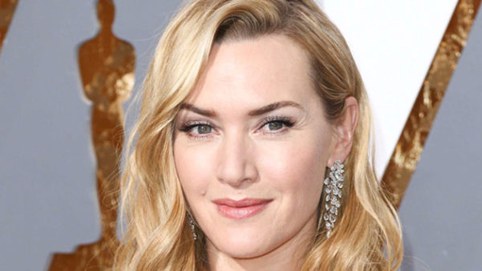 La bouche nude et glossy de Kate Winslet