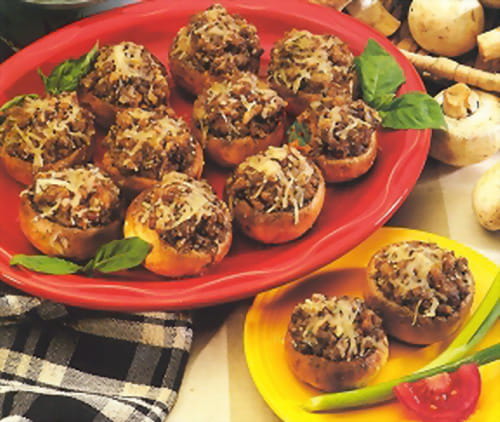 Champignons farcis au jambon, olives noires et mozzarella