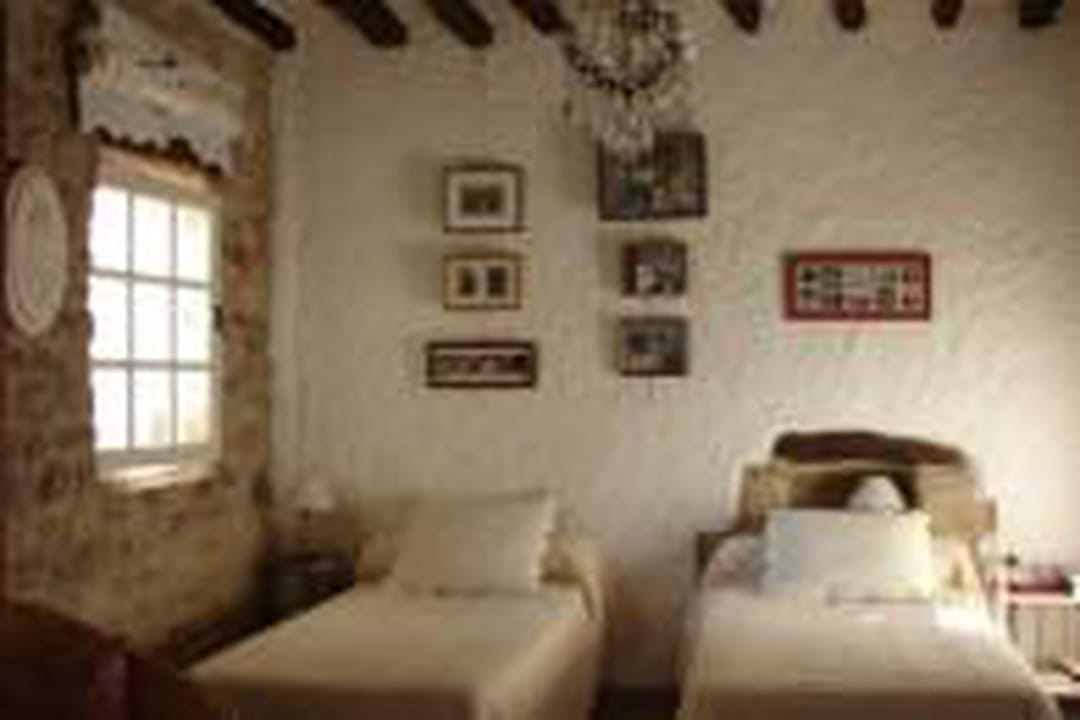 Une chambre sous les poutres