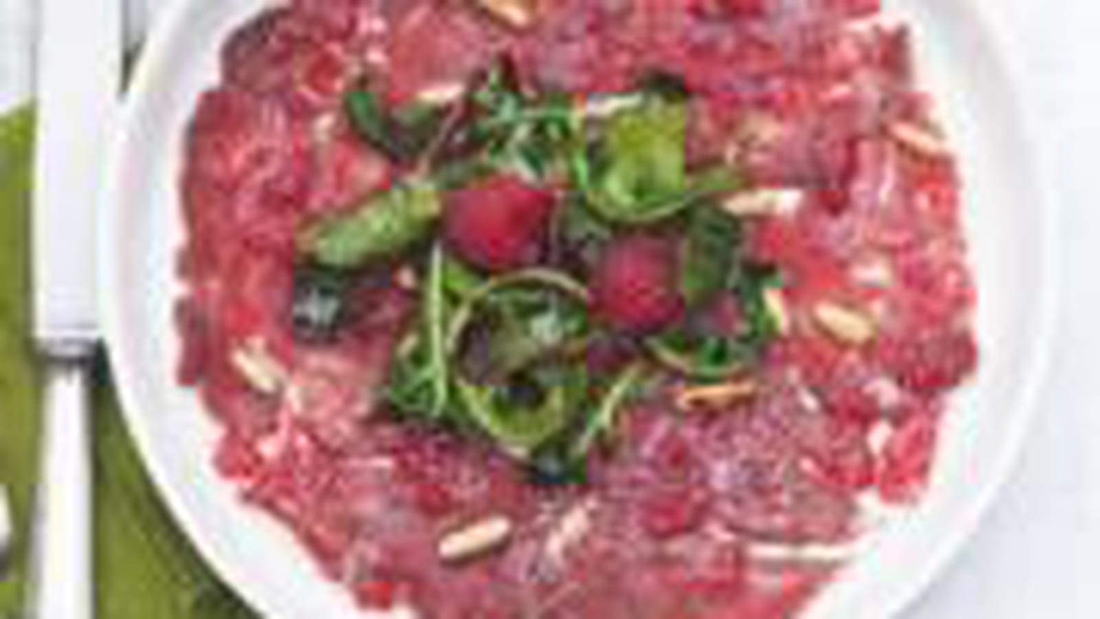 Carpaccio de boeuf à la vinaigrette de framboise